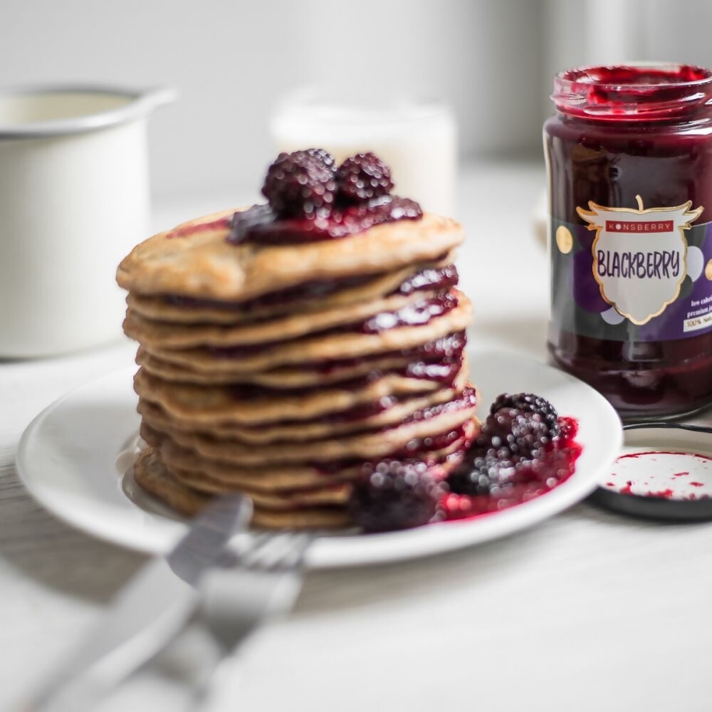 konsberry low calorie premium blackberry preserves halal certified drizzled on pancakes with fresh fruit